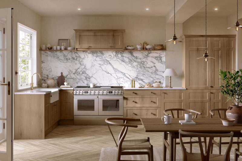Warm, characterful family kitchen with light Canella oak shaker doors and a relaxed open-plan layout