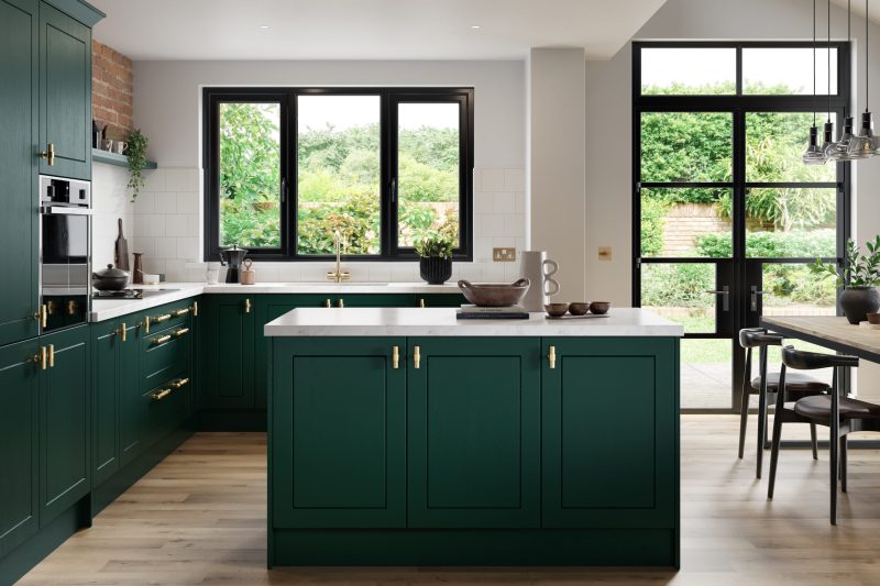 Rich, characterful family kitchen with deep fir green painted shaker doors