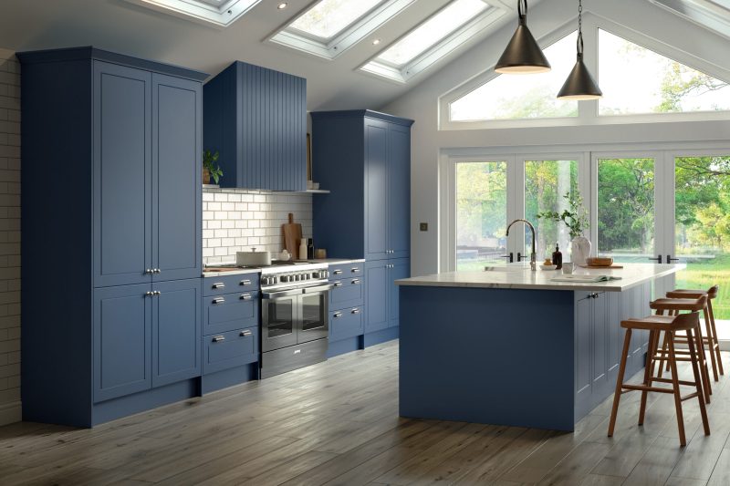 Bright, inviting family kitchen with Alby blue shaker doors and crisp white walls