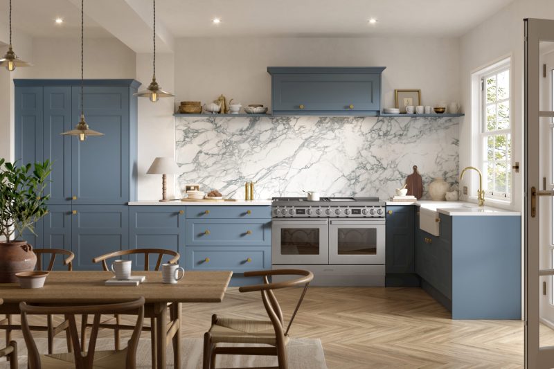 Bright and uplifting family kitchen with soft misty blue shaker doors and pale worktops